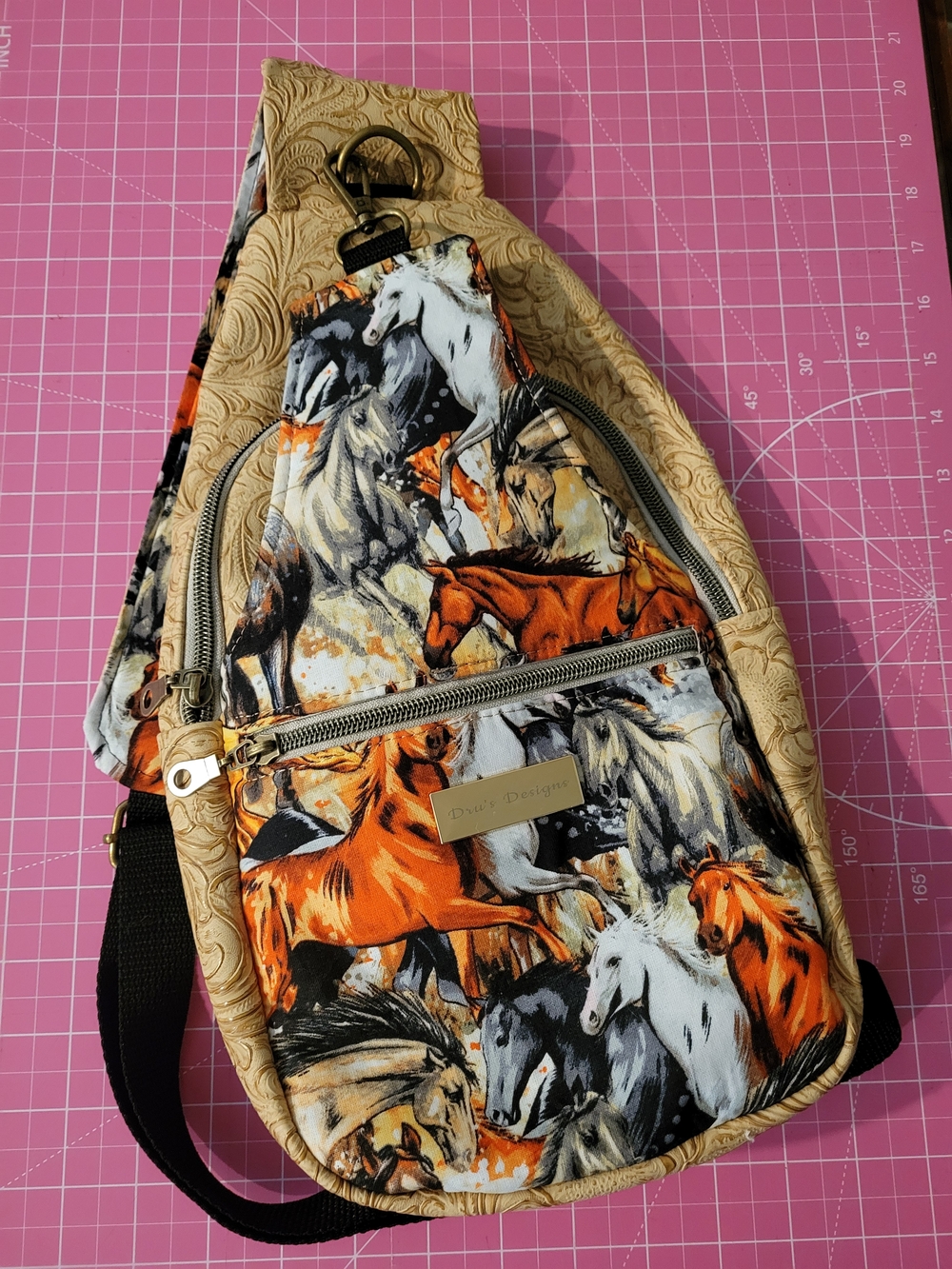Galloping Horses Sling Mini Backpack with Tan Trim